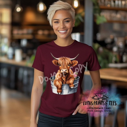 HIGHLAND COW IN A TUB